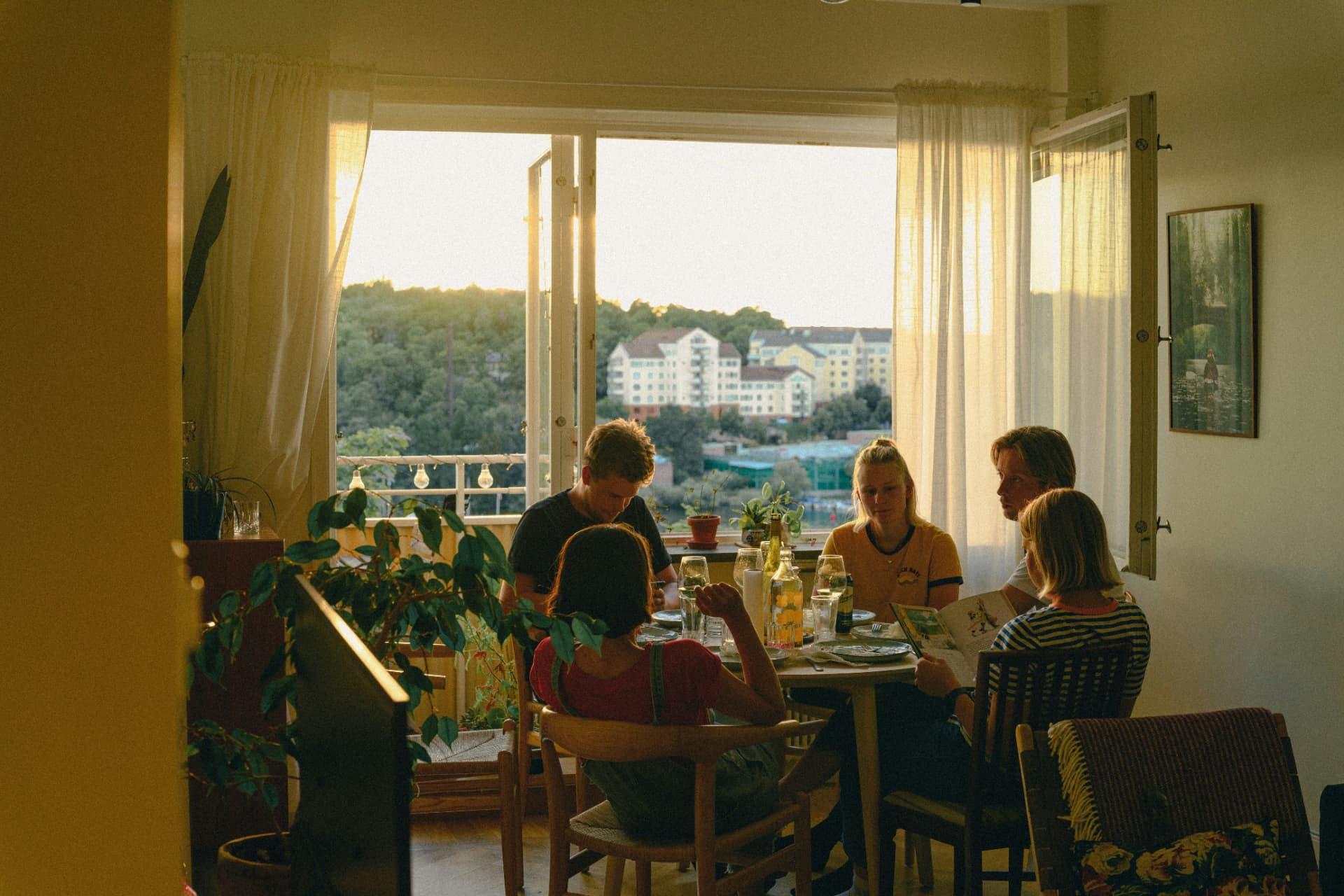 Family sharing a meal together at home