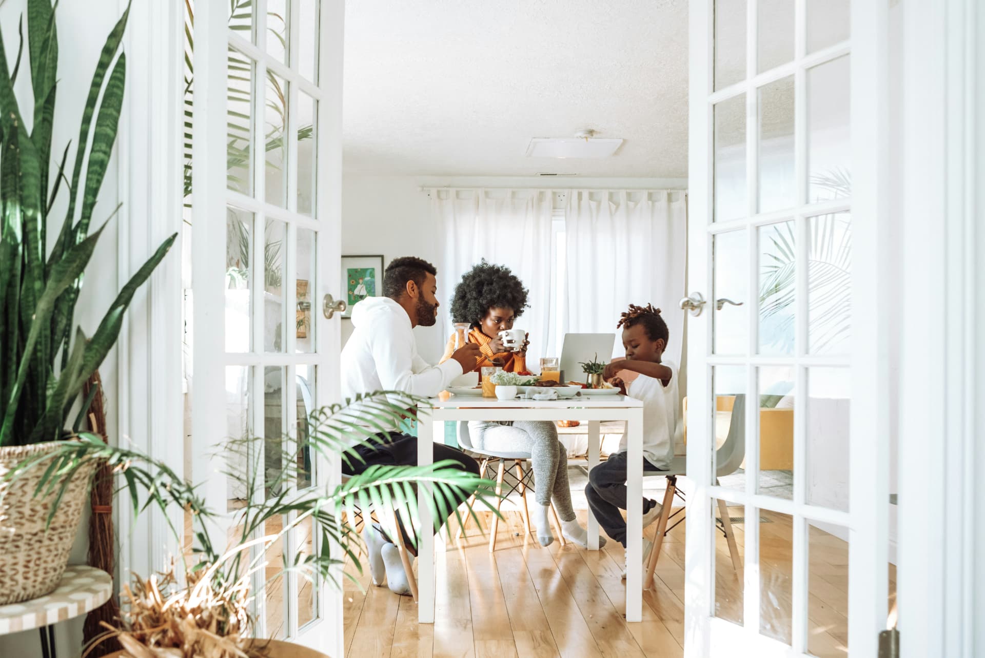 Family having breakfast together at home